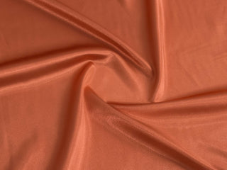 Delicate Peach Acetate/Nylon/Elastane Stretch Satin - NY Designer - 54W >  Satin & Faille Fabric > Fabric Mart